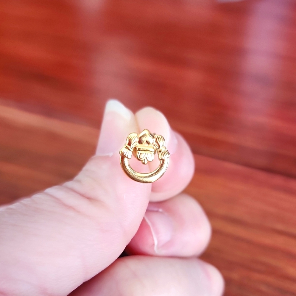 Pair Of Gold Claddagh Stud Earrings